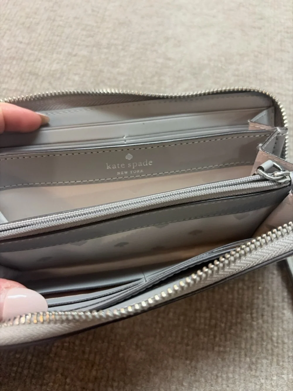kate spade Silver-Tone Logo Pebbled Leather Wallet